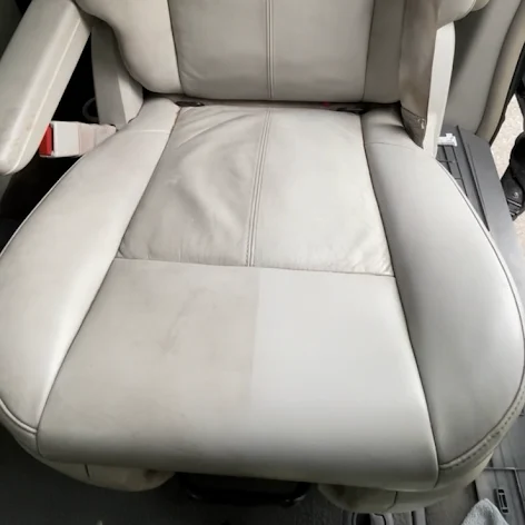 50/50 showing leather seat before and after an interior detail in Croydon