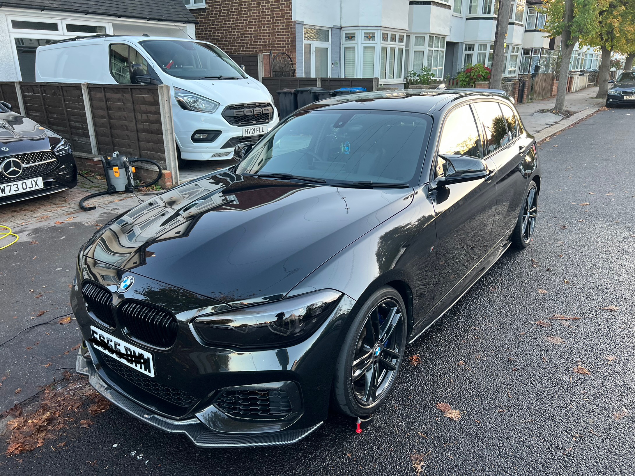 Shining, spotless exterior of a bmw m140i done by Elite AutoCare in Croydon